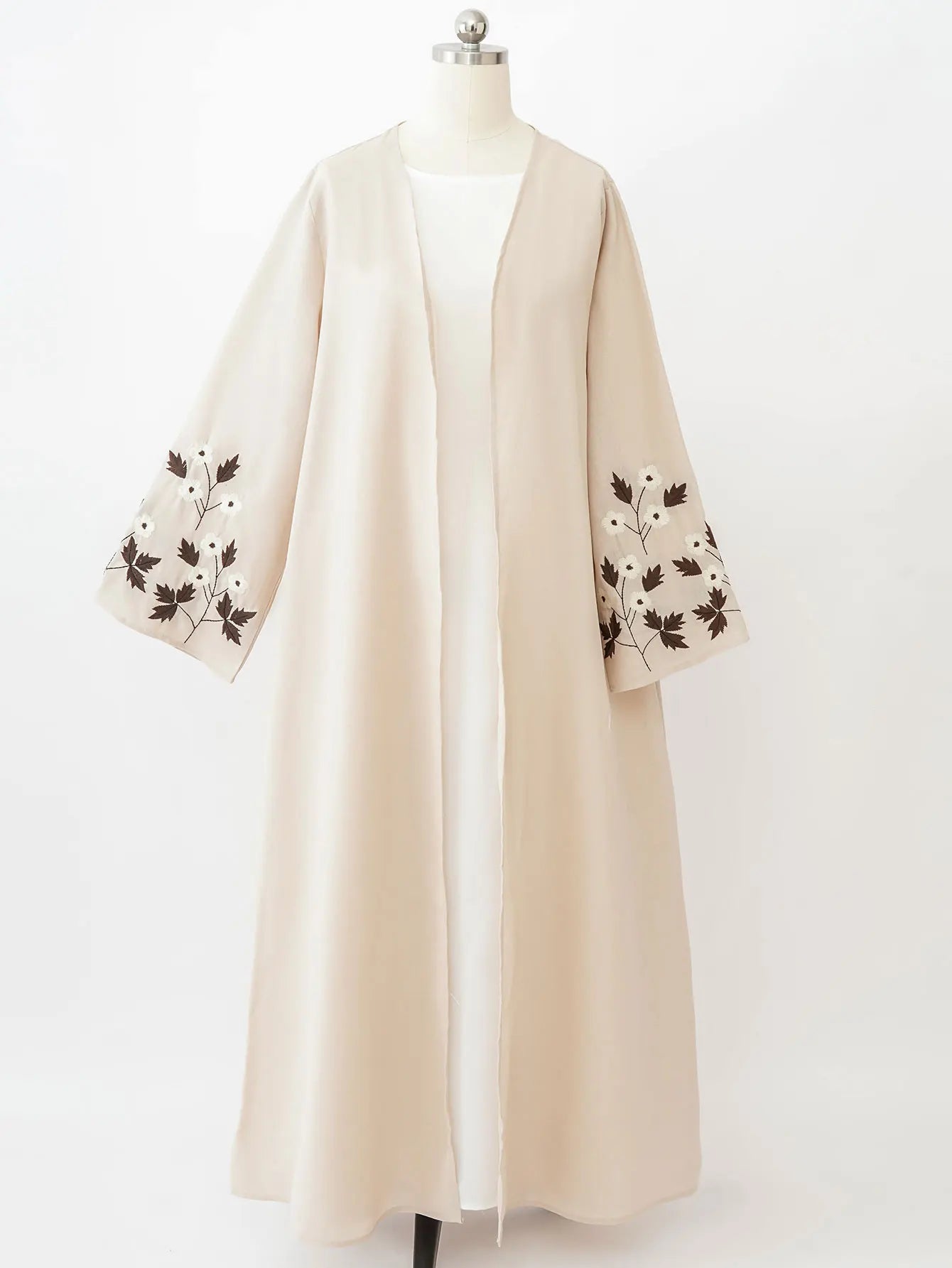 Apricot Color Muslim Abaya Boasting Exquisite Floral Cuff Embroidery Blending Timeless Elegance and Fashion for Ramadan Islamic